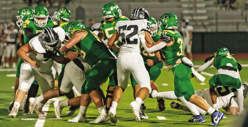 Dublin Lions clash with Lindsay at the line of scrimmage Friday, Sept. 26 during the homecoming game. Danielle Meador | Citizen staff photo