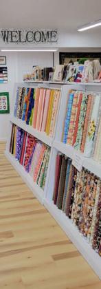 Left, Stitching Sisters Quilt Shop in Comanche showcases colorful bolts of fabric in the new store located at 1303 E. Central Ave. in Comanche. The new store boasts a larger space with an extended classroom to utilize for upcoming sewing and crafting classes.
