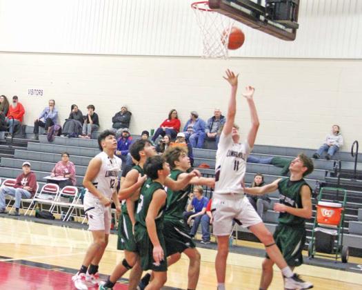 Lingleville Cardinals soar to sink the ball during the Jan. 19 home game against Bluff Dale which ended in a 73-37 victory for the maroon and white. The Cards sat at 4-2 in district last week after the homecoming game and a 33-24 win over Strawn on Tuesday, Jan. 16. Paul Gaudette | Citizen staff photo