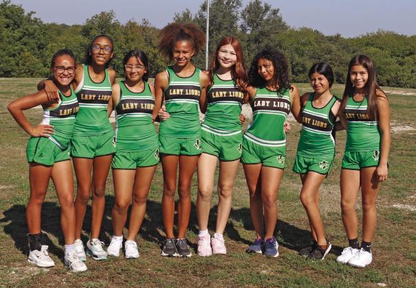 The 2026 7th grade girls cross country team is: Collins Ward, Zora Hunter, Audrina Solano, Emoree Walker, Yasmine Barron, Kenya Ortega, Elizabeth Ortiz and Abrianna Aguilar. Paul Gaudette | Citizen staff photo