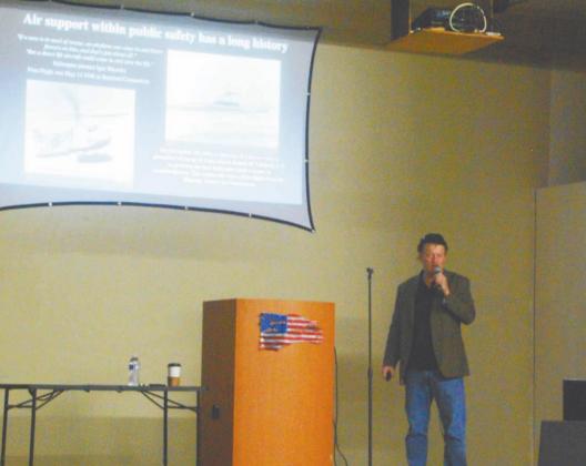 Marc Langley (above) and Gene Robinson (below) speak to first responders and guests during the Jan. 20 presentations at the National Health and Public Safety History Museum’s Knight Theater located upstairs. Paul Gaudette | Citizen staff photo