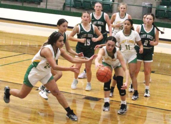 Lady Lions and Breckenridge defenders lunge for the ball during a game Friday, Jan. 5 on the Dublin court. Paul Gaudette | Citizen staff photo