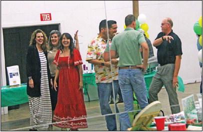 Chamber members and organizers had fun with the mirrors inside Grafton Center at a Chamber Mixer Thursday, Aug. 31. Paul Gaudette | Citizen staff photo