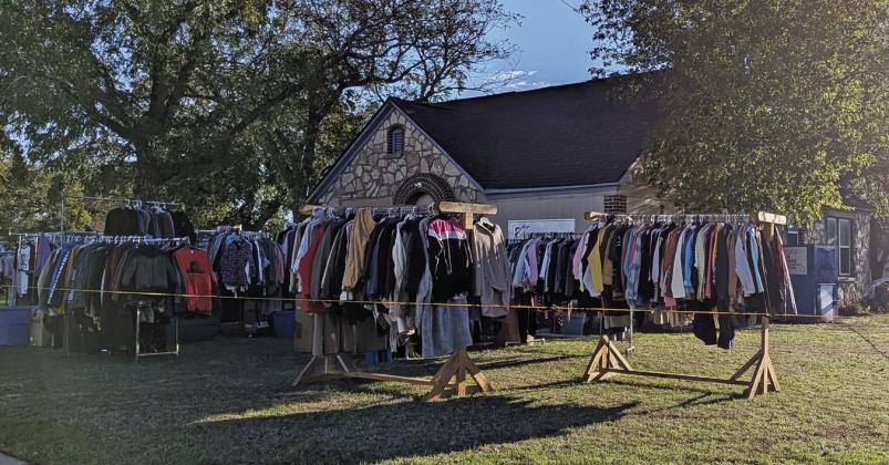 A crowd gathered around Kingdom Threads Saturday, Oct. 17 as the ministry operated under the First Baptist Church of Dublin held its annual winter coat giveaway. Kingdom Threads is located on Camden across from the First Baptist Church and is open every single week on Wednesday, providing free clothing and other items to anyone who needs them. Paul Gaudette | Citizen staff photo