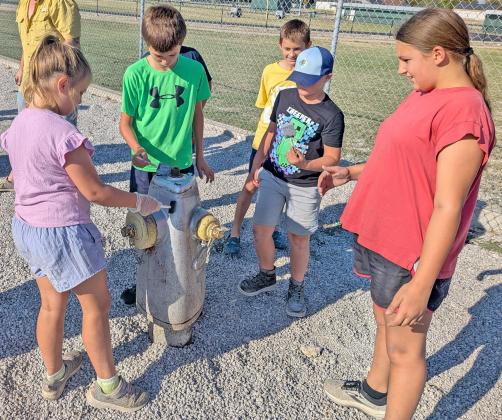 Cub Scouts, 4-H paint hydrants