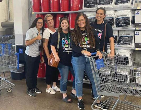 Teachers enjoy spendingd time together at Walmart while collecting supplies for their classrooms, courtesy of DISD. Courtesy photo