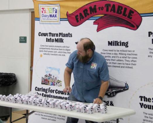 DairyMax hands out cow stress balls and provided yogurt for the Welcome Back Breakfast. Wyndi Veigel | Citizen staff photo