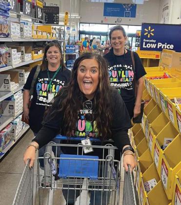 Teachers shopped through aisles of school supplies at Walmart after receiving a $100 giftcard for supplies from DISD. Courtesy photo