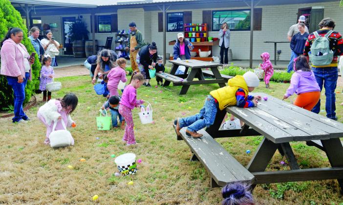 Left, Chloe enjoys some time with the Easter bunny at Texas Sage’s Easter Egg Hunt Saturday, April 4. It was her first Easter. Above, kids of all ages hunt through the grounds for egs at Texas Sage, located on Hwy. 6 in Dublin. Wyndi Veigel-Gaudette | Citizen staff photos