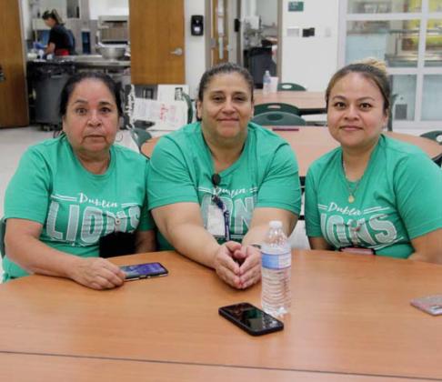 Staff members help serve breakfast for the annual Welcome Back breakfast for Dublin ISD employees. Below, custodial staff members enjoy having breakfast together. Wyndi Veigel-Gaudette | Citizen staff photo