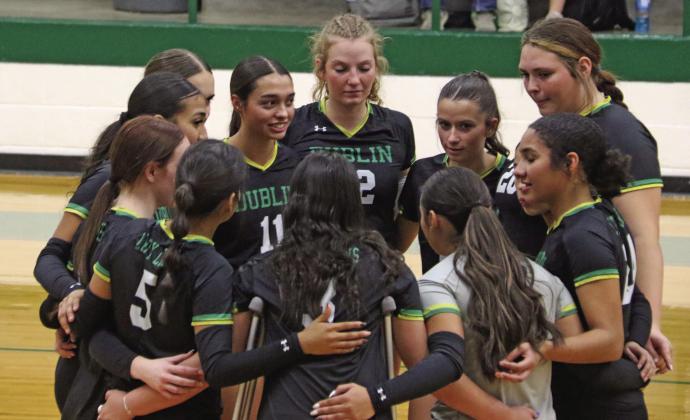 The Dublin Lady Lions volleyball girls huddle up during their final home game of the season against Comanche Tuesday, Oct. 14. Paul Gaudette | Citizen staff photo