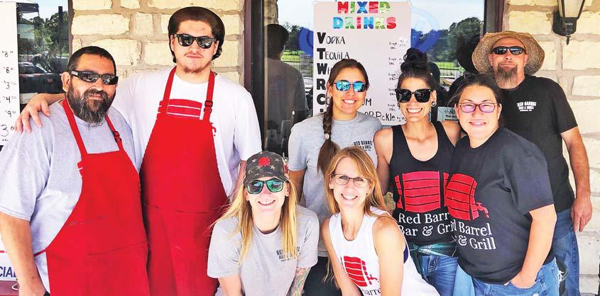The Red Barrel Bar and Grill Crew pose during a recent fundraiser for St. Jude’s. The restaurant features fresh-made fare like (below) grilled chicken, Red Barrell Bites and the Red Barrell Ribeye sandwich | Courtesy and Citizen staff photos