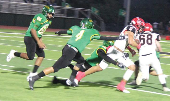 Paul Gaudette | Citizen staff photo Dublin Lion Francisco Garcia takes down an Eastland runner during the home game Friday, Oct. 27 as Aiden Salyer reaches out to assist. The Lions will head to Jacksboro on Friday, Nov. 3 for a tough battle to close out their season. Ticket sales are online only so Lion fans will need to hit the Jacksboro website to pay for entry.