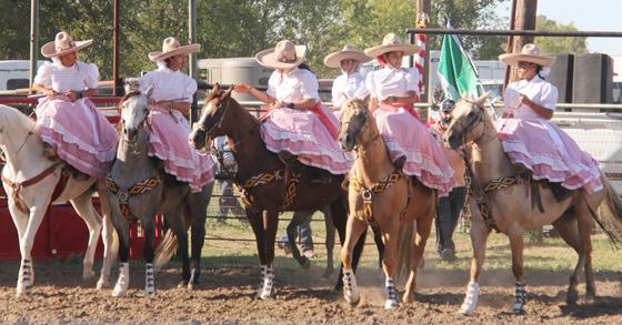 Escaramuza riders perform sidesaddle on horseback during the Hispanic Heritage Rodeo. Wyndi Veigel | Citizen staff photos