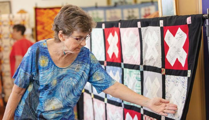 The Dublin Historical Museum was a little more colorful June 13-14 as local quilters displayed old and new quilts including a friendship quilt (below, displayed by Elaine Fields Smith) pieced together with squares stitched by Dubliners many years ago. A reception was held for the exhibit Saturday, June 14 with Cross Timbers Fine Arts Council serving refreshments. Danielle Meador | Citizen staff photos