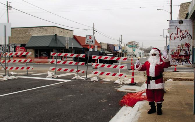 Santa enthusiastically waves to passersby outside the CWJC Thrift store in downtown Dublin. Santa and Mrs. Claus were taking a break from the North Pole to visit all of Dublin’s good girls and boys. For more photos of all of this week’s Christmas events, see The Dublin Citizen Facebook page. Wyndi Veigel-Gaudette | Citizen staff photo
