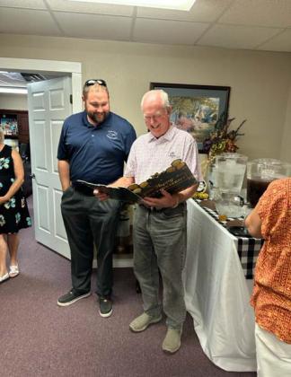 A reception was held Friday, July 28 honoring the retirement of former Erath County Chief Appraiser Jerry Lee. Pictured with him is current Erath County Chief Jonathan Pringle, presenting Lee with a special retirement gift. Courtesy photo