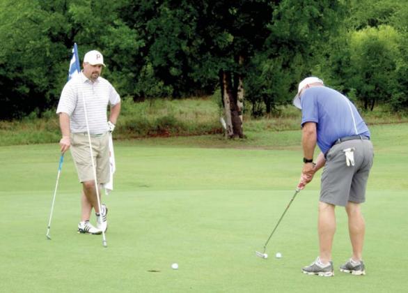 Hogan tourney on Par despite delay