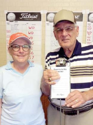 Hogan tourney on Par despite delay