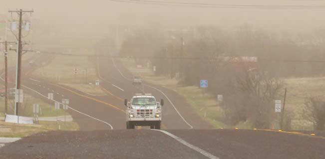 A Dublin VFD truck was coming back from a grass fire call Tuesday, March 4 as sand casts a haze over Erath County from 60 mph wind gusts. A high wind warning was issued and caused havoc in the area. Wyndi Veigel-Gaudette | Citizen staff photo