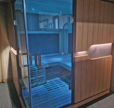 An infrared sauna will seat four for those who want to gather at The Wellness Place with friends. Below, a massage room is available for appointments with two different massage therapists. Wyndi Veigel-Gaudette | Citizen staff photo