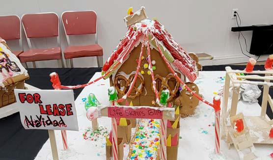Many houses made by DISD groups include ‘For Lease Navidad’, constructed by the Life Skills class (above). Below, Dublin FFA built a farm, complete with animal droppings. Wyndi Veigel-Gaudette | Citizen staff photo
