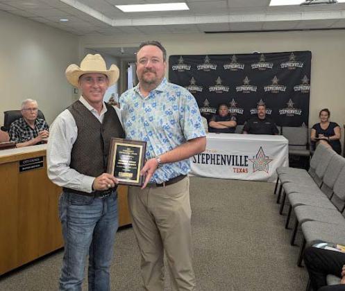 Economic Development Authority Executive Director Jeff Standford received the Workforce Excellence Award from the statewide Texas Economic Development Council on behalf of SEDA. Mayor Pro Tem David Baskett presented the award. Paul Gaudette | Citizen staff photo
