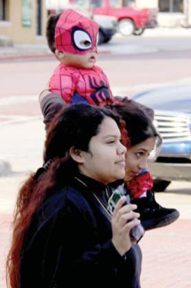 A small Spider-Man is carried for the Safe Trick-or-Treat on Halloween. Paul Gaudette | Citizen staff photo