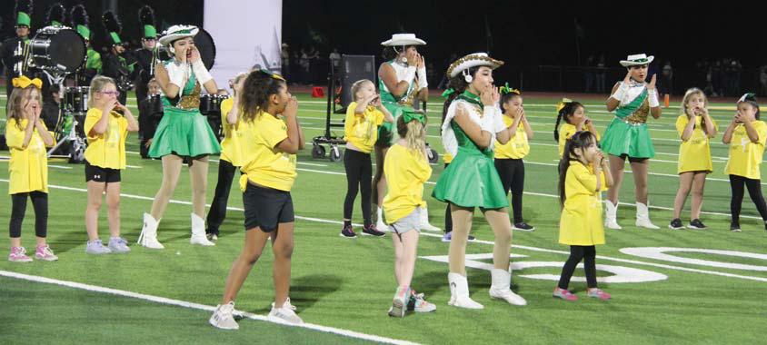 Youngsters belonging to a mini drill team camp performed with the Dandi-Lions Friday, Oct. 20 at half time and spent time with them at the football game. Paul Gaudette | Citizen staff photo