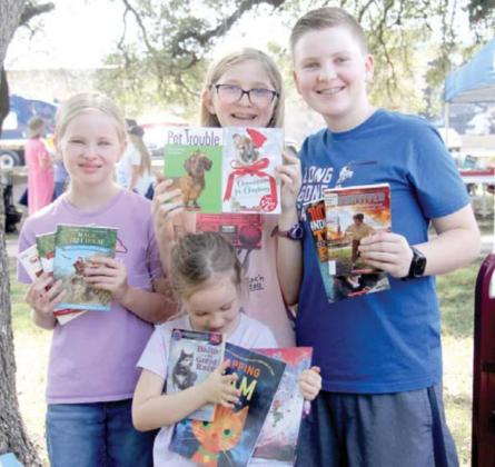 Kids enjoy picking out free books after turning in reading logs at the end of the Summer Reading Program with the Dublin Public Library. Participants were eligible to pick out three free books. Wyndi Veigel | Citizen staff photo