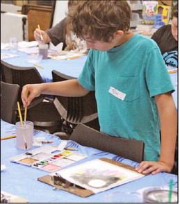 Kids of all ages enjoyed a week of art camp led by instructor Sarah Warner Svadlenka at the Dublin Public Library last week. Svadlenka opened up the world of watercolors, leading them through themed exercises like space scenes and encouraging them to work on original pieces in between exercises. Paul Gaudette | Citizen staff photos