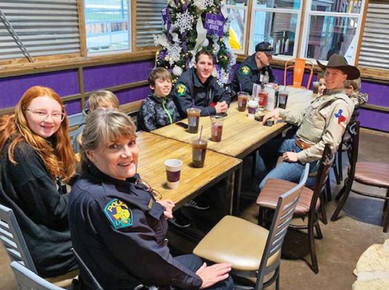 Dublin PD Officers and Constable Ryan Gibson enjoy breakfast at The Purple Goat with youngsters prior to the Erath County Shop with a Cop event. Submitted photo