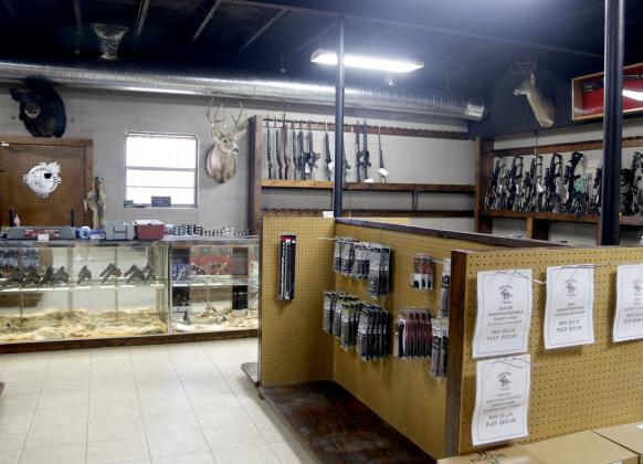 Part of the inside of Cowboy Capital Venture sits displaying ammo and guns. The new establishment is located on the Dublin Loop and is open 9 a.m. to 6 p.m. Tuesday through Thursday, 9 a.m. to 8 p.m. Friday and Saturday. Wyndi Veigel-Gaudette | Citizen staff photo