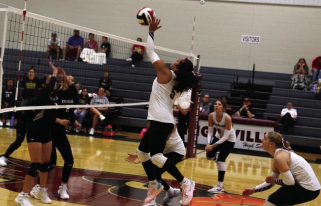 Lingleville Lady Cardinal Nevaeh Jacinto springs up for a kill against Merdian in a Saturday, Sept. 12 game that resulted in a Lingleville victory. Paul Gaudette | Citizen staff photo