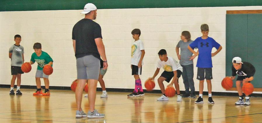 Young DHS basketball hopefuls were led through lessons and games by coaches in the gyms as part of the annual basketball camp May 27-29. Wyndi Veigel-Gaudette | Citizen staff photos