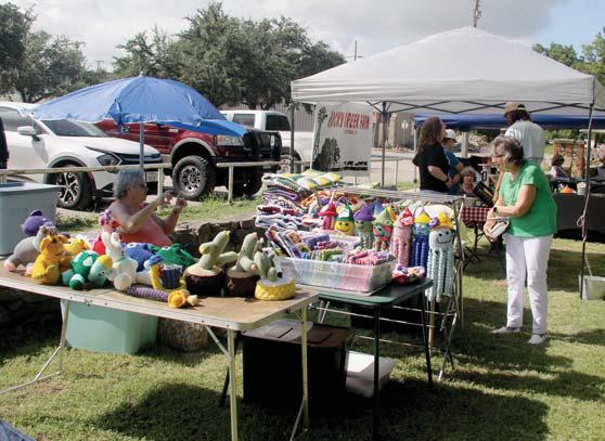 A wide variety of vendors participated in the Saturday, June 21 Market Days at Wright Park in Dublin. Larry Stanford with the Stephenville Area Elk’s Lodge holds out homemade breakfast burritos as part of a fundraiser. Paul Gaudette | Citizen staff photo