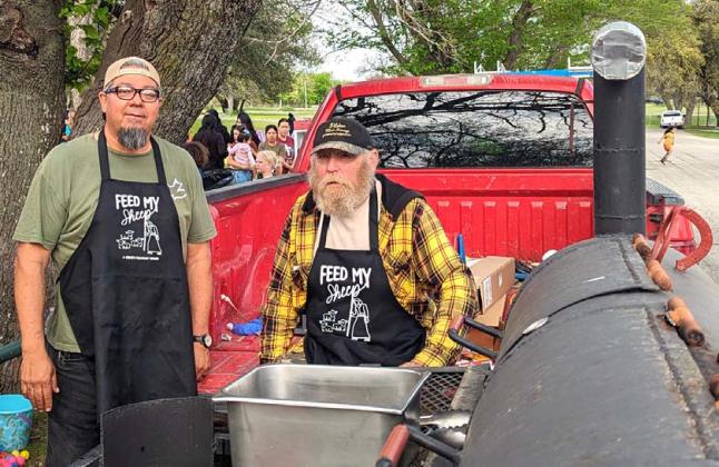 Calvary Fellowship’s Feed my Sheep volunteer group prepares hot dogs at the annual Dublin EGGStravaganza Saturday, March 30 at the City Park. Paul Gaudette | Citizen staff photo