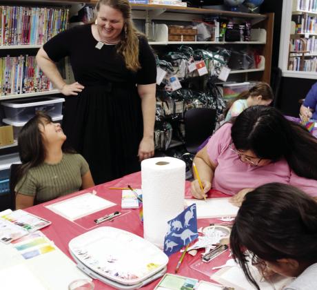 Sarah Warner Svadlenka instructs students of all ages at a week long watercolor class on techniques while painting a variety of dinosaurs. The class was held at the Dublin Public Library July 7-10. For more photos see The Dublin Citizen Facebook page. Wyndi Veigel-Gaudette | Citizen staff photos