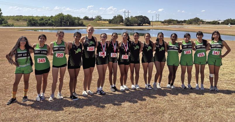 Cross Country runners medal at