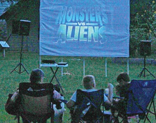 The Dublin Public Library held an outdoor screening of the animated movie “Monsters vs. Aliens” Friday, June 14 to tie in with the UFO event. Adina Dunn | Citizen staff photo