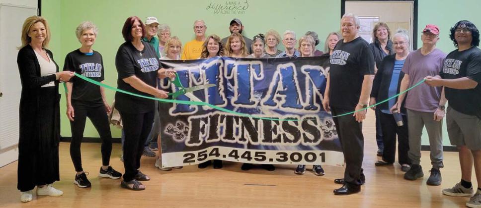 Donna and Steve Hightower, center, owners of Titan Fitness are surrounded by members of the Dublin Chamber of Commerce, clients and friends at a ribbon cutting ceremony Wednesday, Feb. 26 after they joined the chamber. Titan Fitness is located at 125 S. Patrick Street in downtown Dublin. The gym offers 24/7 access with affordable membership. For more information call 254-875-0070. Wyndi Veigel-Gaudette | Citizen staff photo