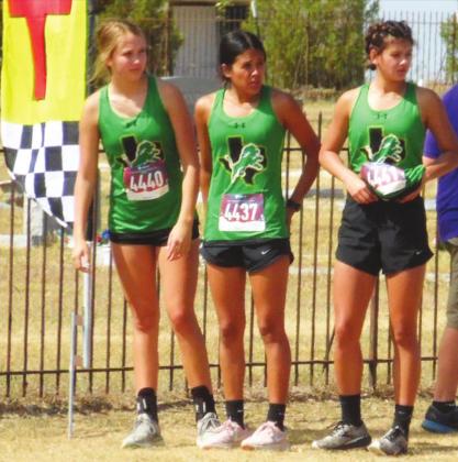 Poised at the starting line for the Girls 3200M