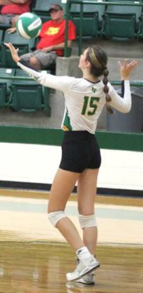 Lady Lion Jaclyn Gibson rears back to serve the ball in a Aug. 8 home game. Paul Gaudette | Citizen staff photo