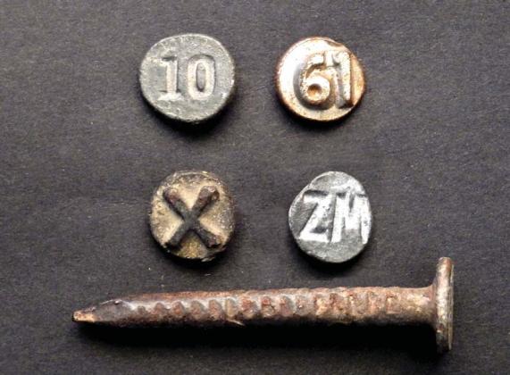 Railroad date nails were hammered into cross ties and documented when they were first put into service. Cross ties had to be checked on a regular basis. Photo: Dublin Historical Museum. | Dublin Hiistorical Museum photo