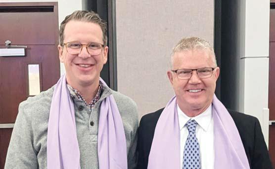 From left, Erath County Sheriff Matt Coates and Stephenville Police Chief Dan Harris, Erath County Judge Brandon Huckabee and CTFS Board President and Tarleton Police Chief Matt Welch don lavender scarves at the annual brunch in support of the cause. Guests were all presented free pashmina scarfs as a thank you for supporting CTFS. Paul Gaudette | Citizen staff photo