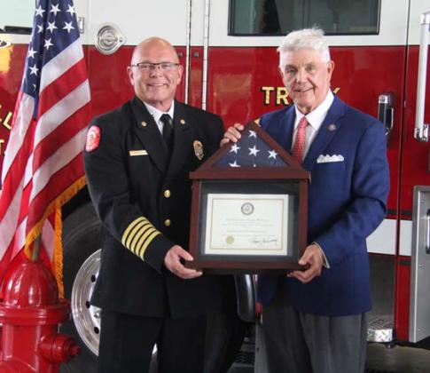 Stephenville Fire Chief Robert Isbell, left, is presented a flag flown over the U.S. Capitol building by U.S. Congressman (TX-25) Roger Williams. Wyndi Veigel | Citizen staff photo