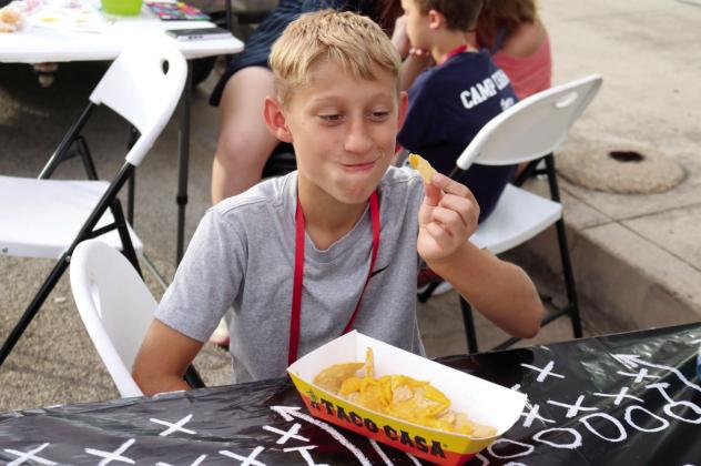 Many enjoyed delicious nachos while supporting the Stephenville High School Band with its fundraiser during the event near Frames Etc. David Swearingen | Citizen staff photo