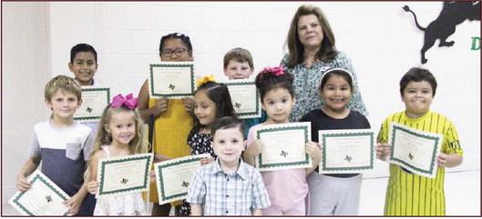 Lion Leaders Jetti Arrott and Tuff Harris (Pre- K), Asher Dale and Zoe Garcia (Kindergarten), Coyt Curry and Luisa Enhorabuena (First grade), Gary Tamez and Arisbeth Torres (2nd grade), Hazel Palomo and Alexis Perez (3rd grade). Presented by Principal Brandy Carr.