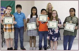 Gemma Gill and Mateo Hernandez (4th grade), Liam Gill and Ariana Rodriguez (5th grade) and Samuel Minor and Valeria Rodriguez (6th grade). Presented by Principal Amanda Lisso. ‘Paws’itive Leaders