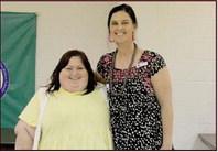 Junior High School Staff Member of the Month Jaclyn Perry. Presented by Assistant Principal Holly Curry
